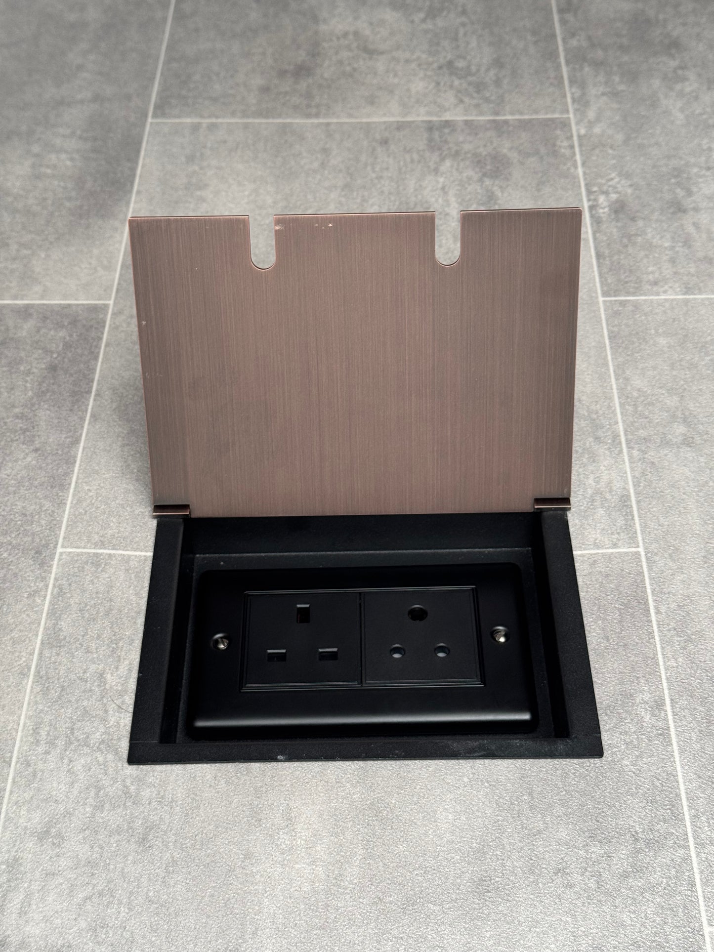 Recessed floor socket double box in antique copper with one 13 amp and one 5 amp unswitched socket