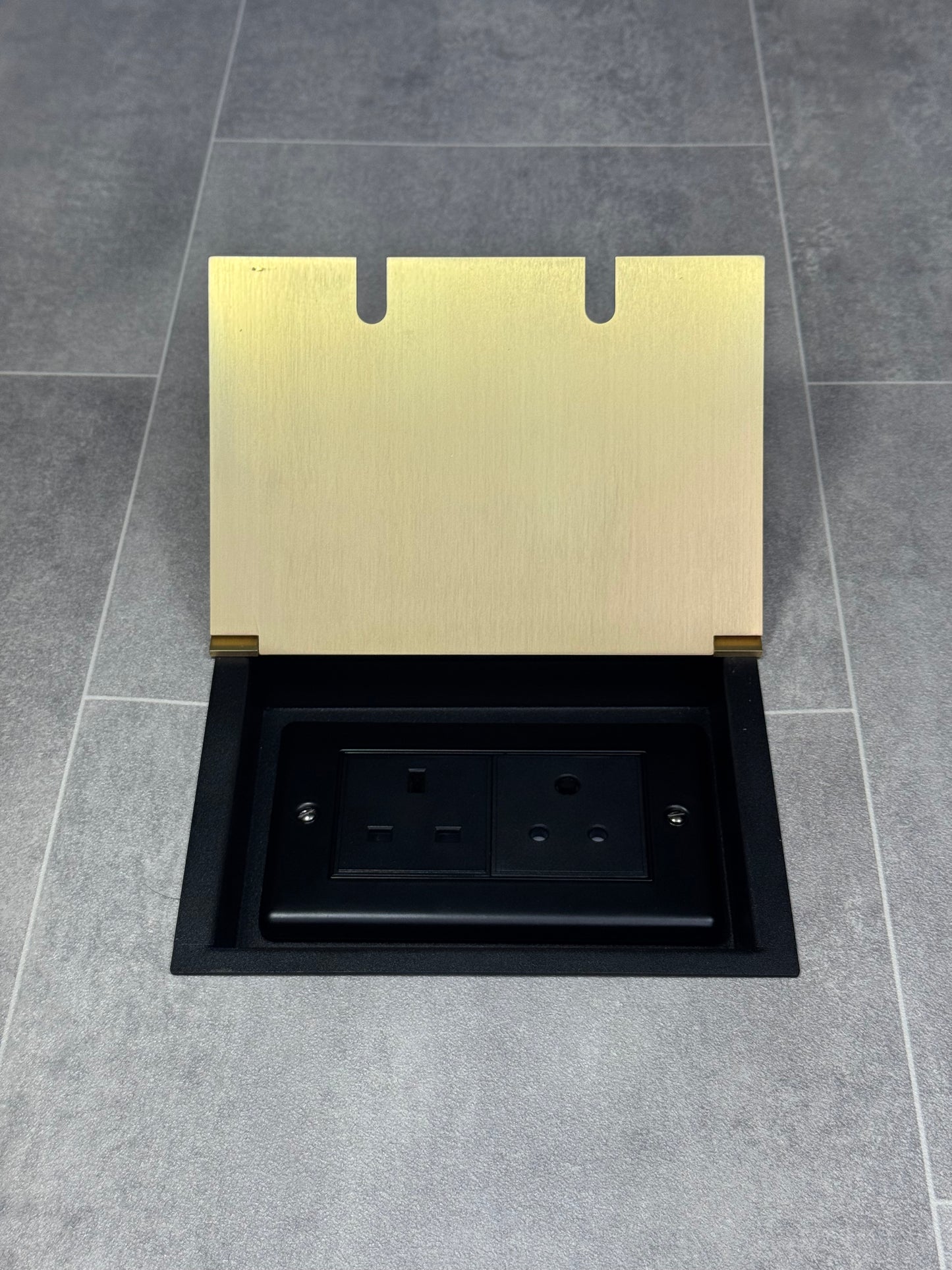 Recessed floor socket double box in satin brass with one 13 amp and one 5 amp unswitched socket.