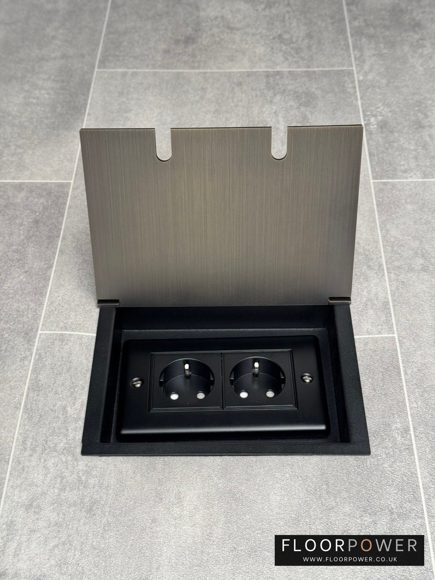 Antique brass recessed floor socket with a double 13amp unswitched Schuko (European) plug socket