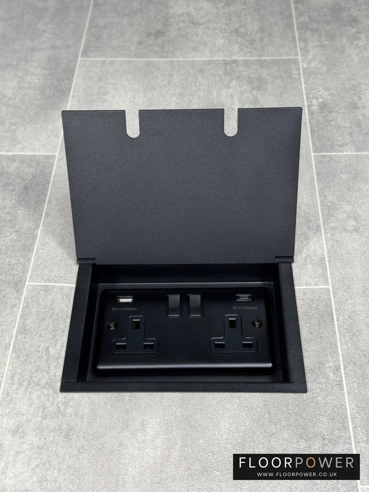 Double recessed floor socket in matt black, featuring a double 13 Amp switched socket with USB C+A charging ports.