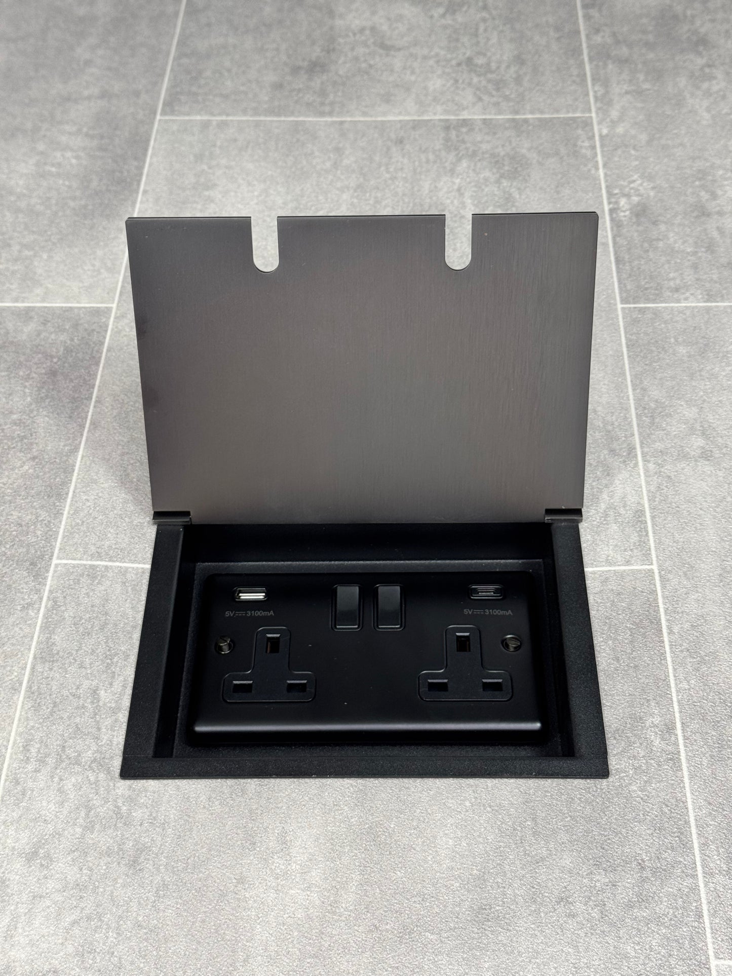 Recessed floor socket in old bronze with a double gang design, featuring a double 13 Amp switched socket with USB C+A.