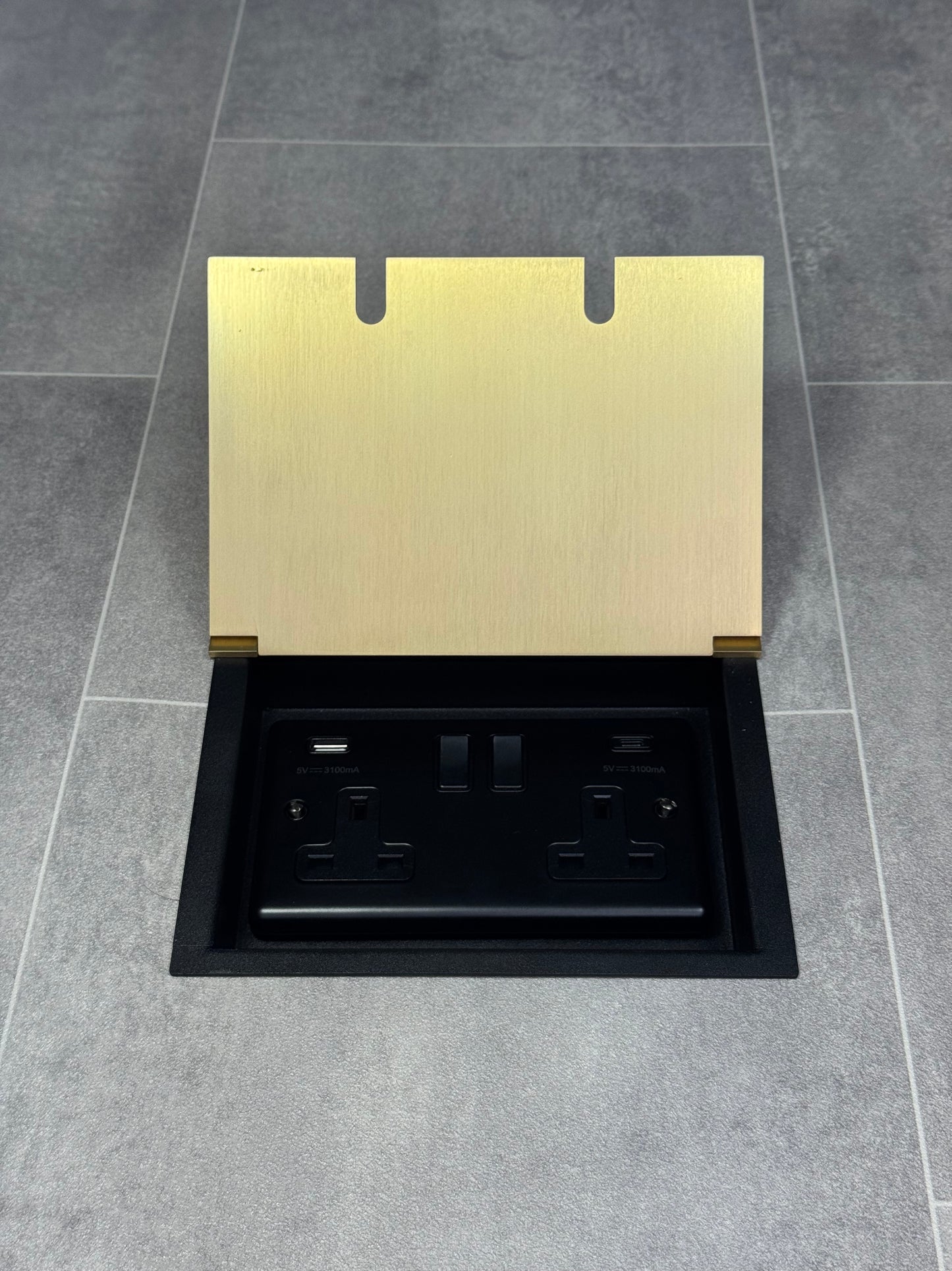 Double recessed floor socket in satin brass, featuring a double 13 Amp switched socket with USB C+A charging ports.