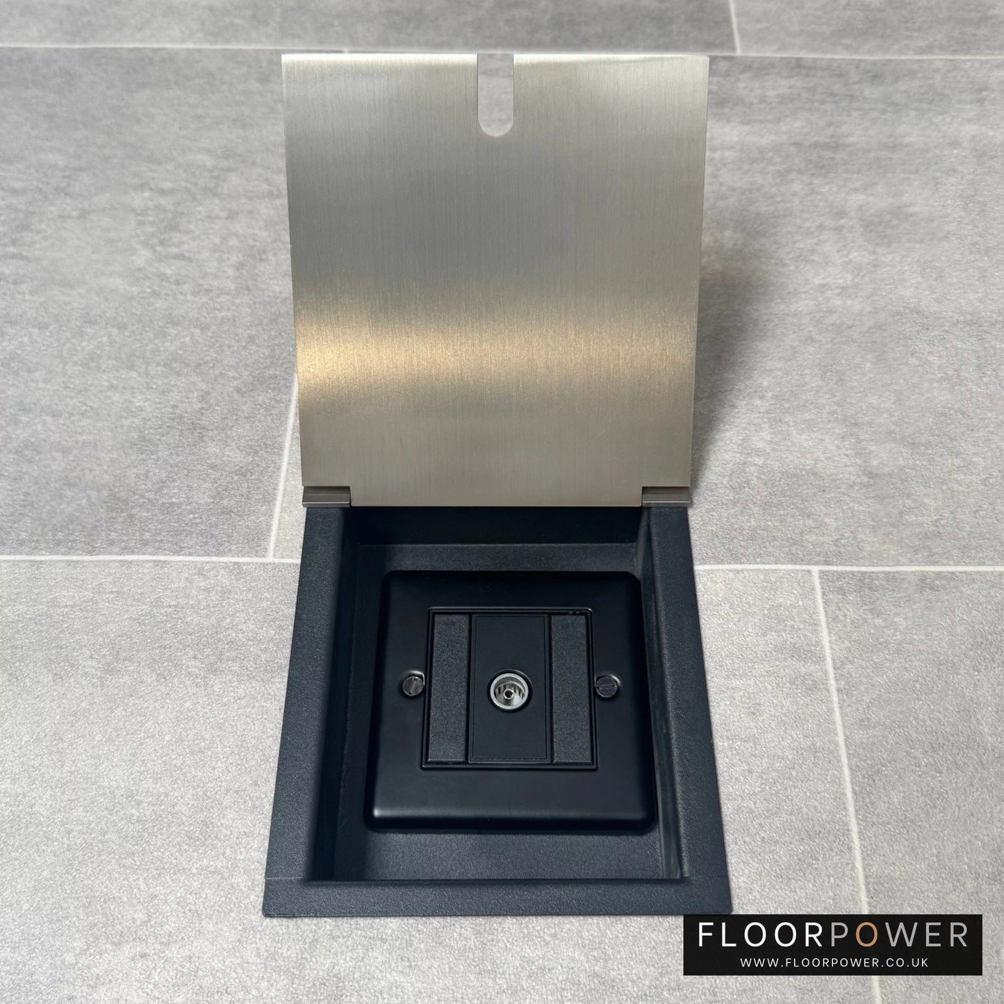 Recessed floor socket in satin nickel with a single TV aerial socket.