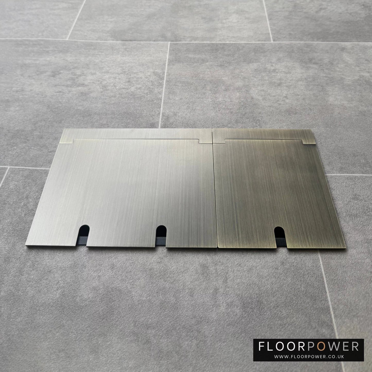 Closed Triple Recessed Floor Socket in Antique Brass on tiled floor.