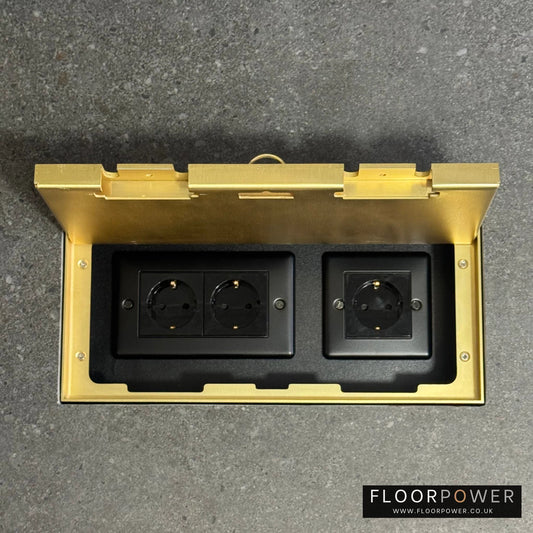 Triple Schuko (European) Plug Socket Flush Recessed Floor Socket with Satin Brass surround in grey stone floor