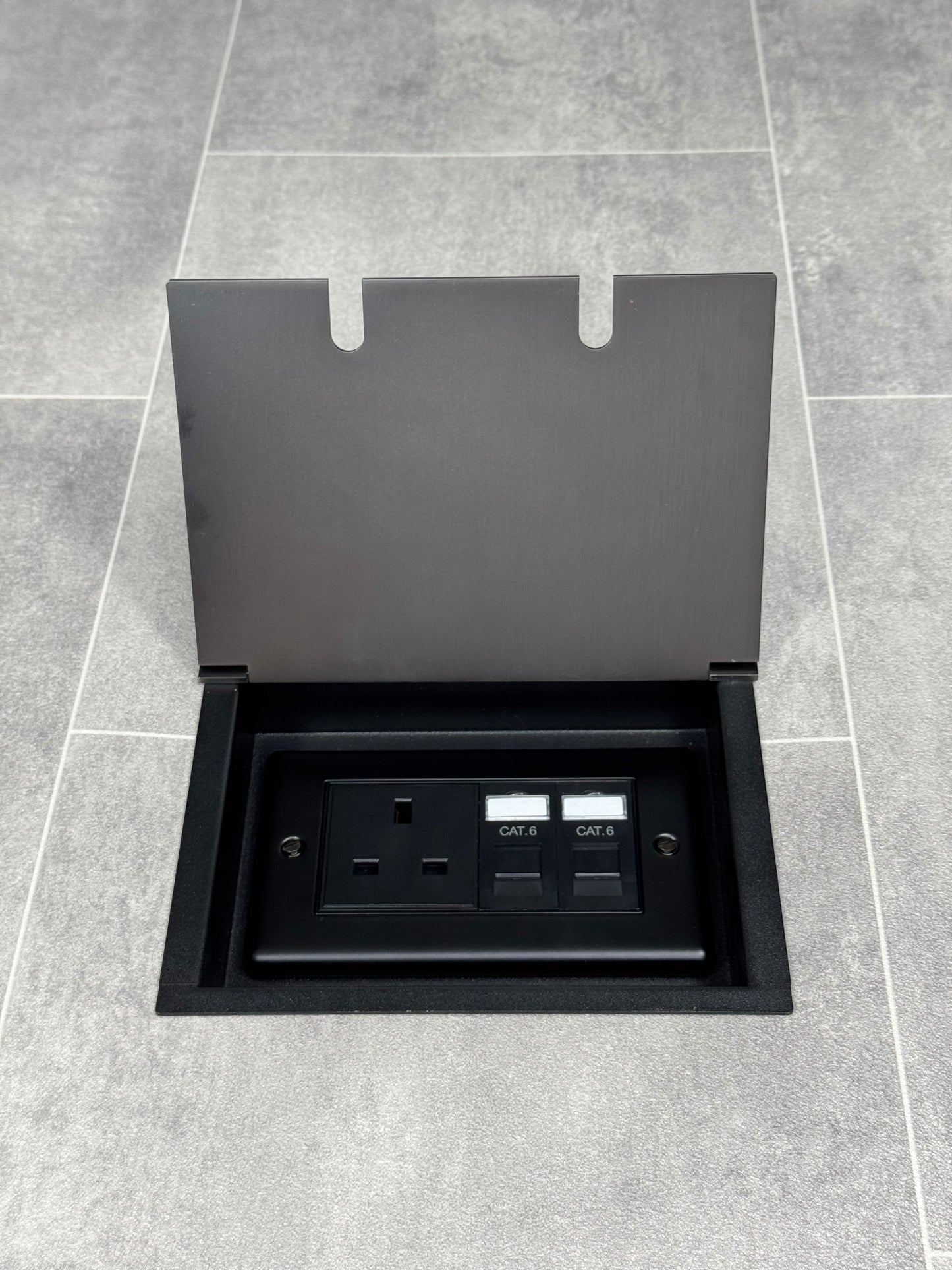 Recessed floor socket double box in old bronze with one 13amp unswitched socket and two RJ45 sockets.