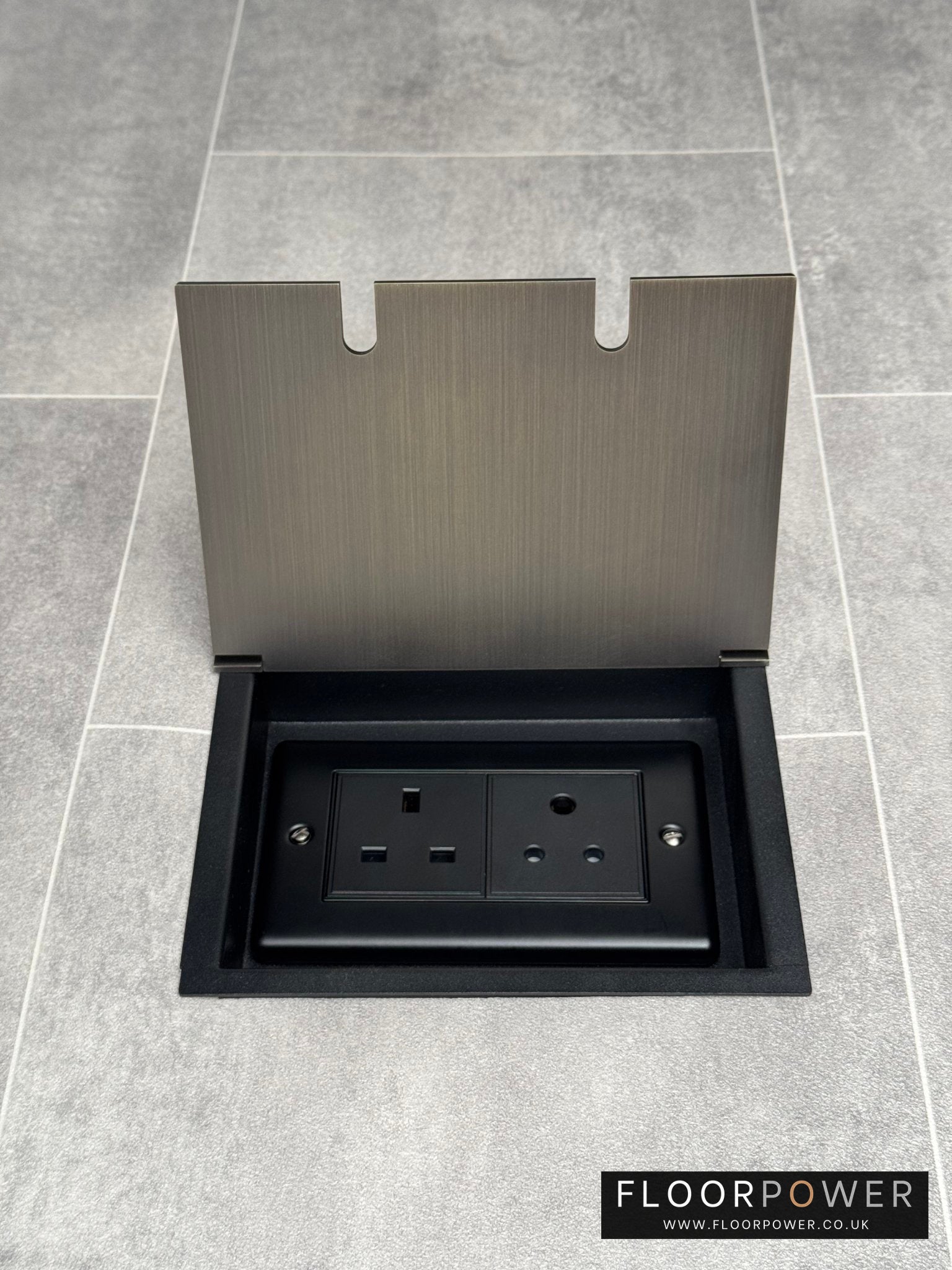 Recessed floor socket double box in antique brass with one 13amp and one 5 amp unswitched socket