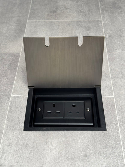 Recessed floor socket double box in antique brass with one 13amp and one 5 amp unswitched socket