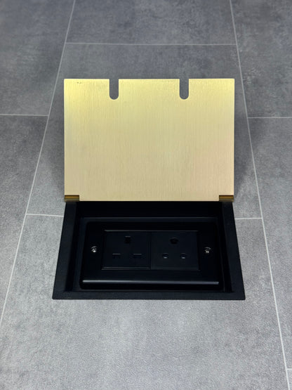 Recessed floor socket double box in satin brass with one 13 amp and one 5 amp unswitched socket.
