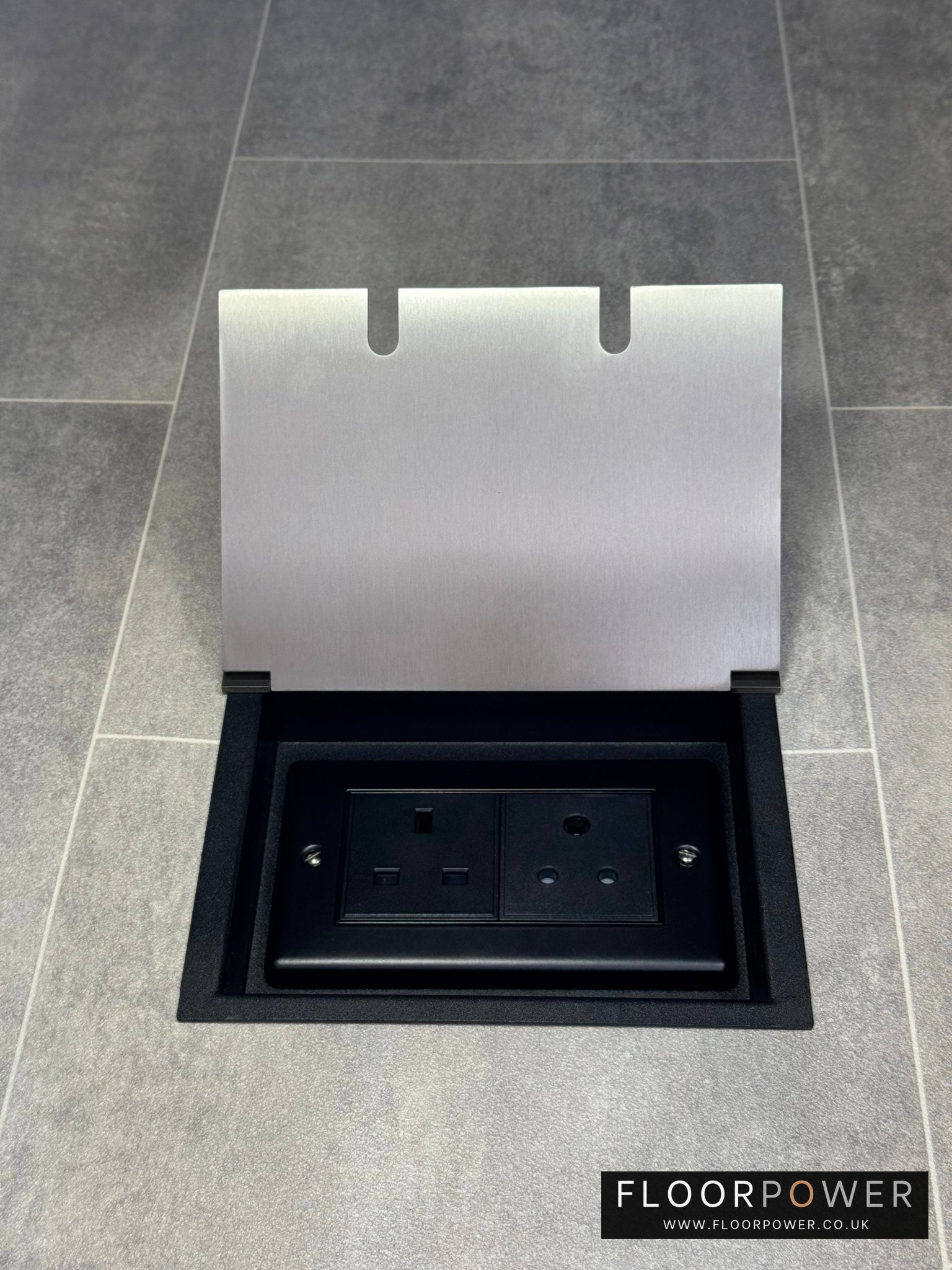 Recessed floor socket double box in satin stainless with one 13 amp and one 5 amp unswitched socket.