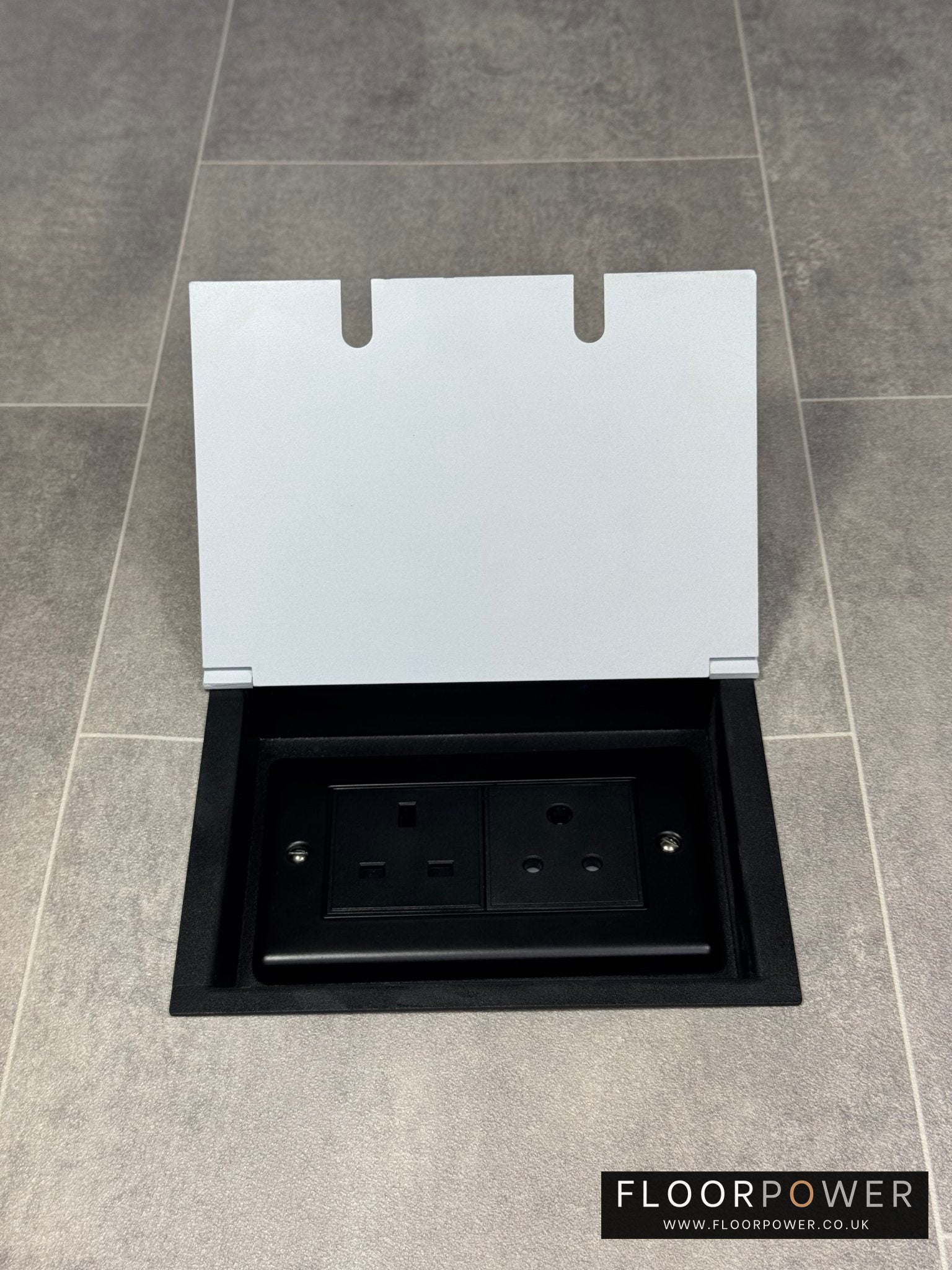 Recessed floor socket double box in white with one 13 amp and one 5 amp unswitched socket.