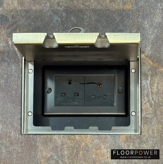 Antique Brass Double Recessed Flush Floor Lighting Combination Socket (13A & 5A Round Pin Plug Sockets) in a stone floor.