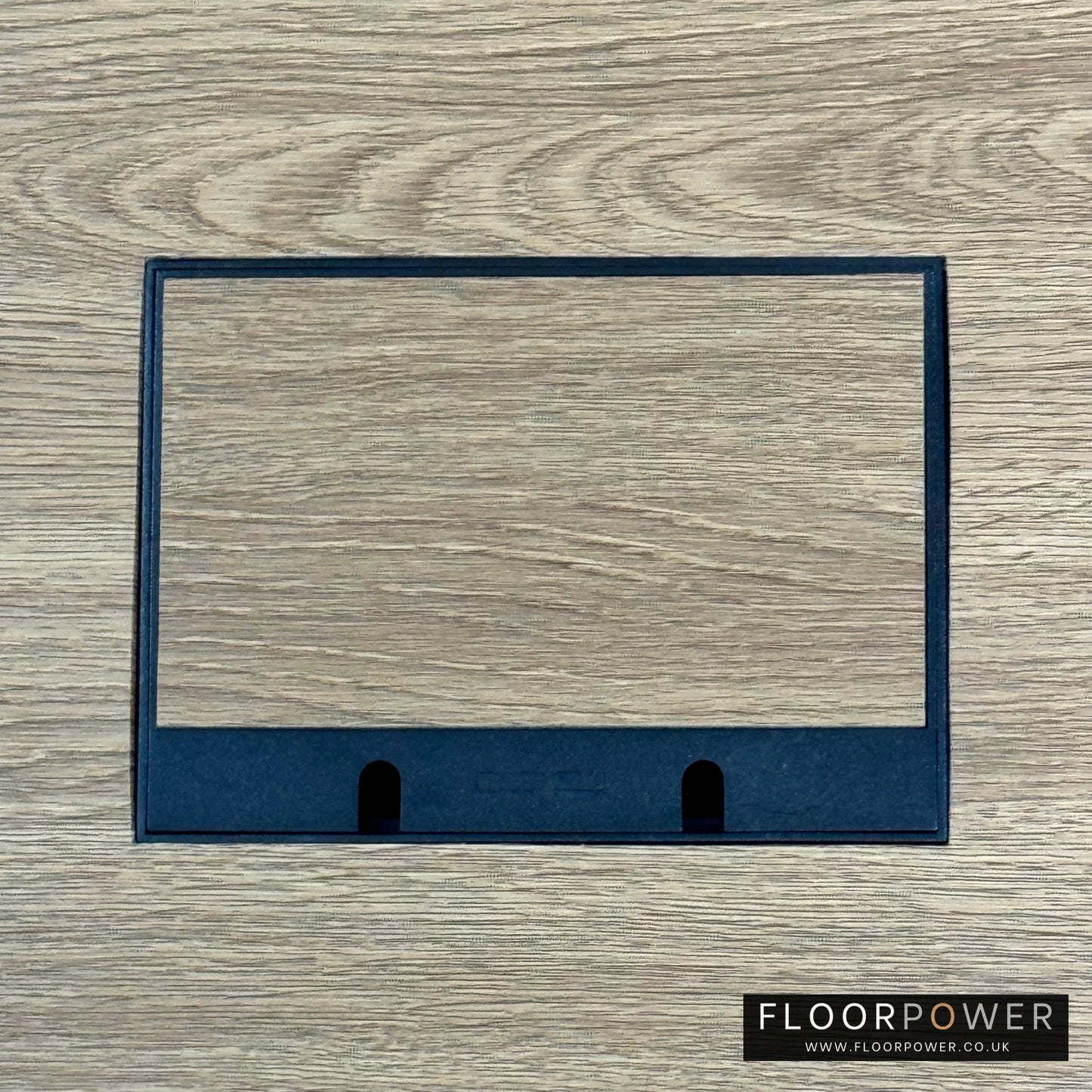 Matt Black Double Recessed Flush Floor Sockets in an Oak Floor with oak flooring also inset into the lid.