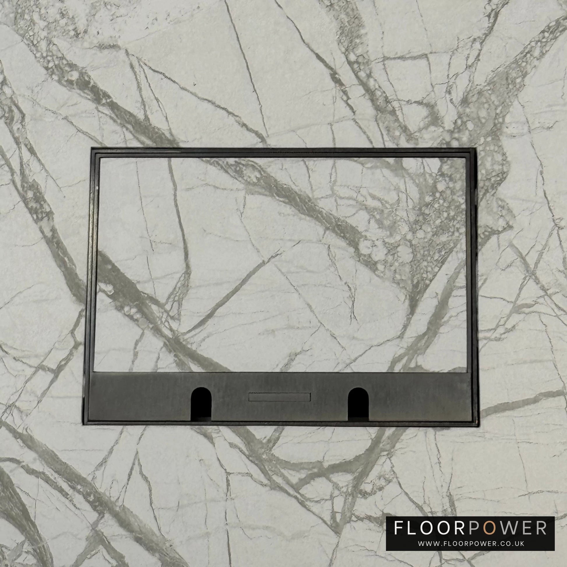 Old Bronze Double Recessed Flush Floor Sockets in a Marble Floor with the marble also inset into the lid.