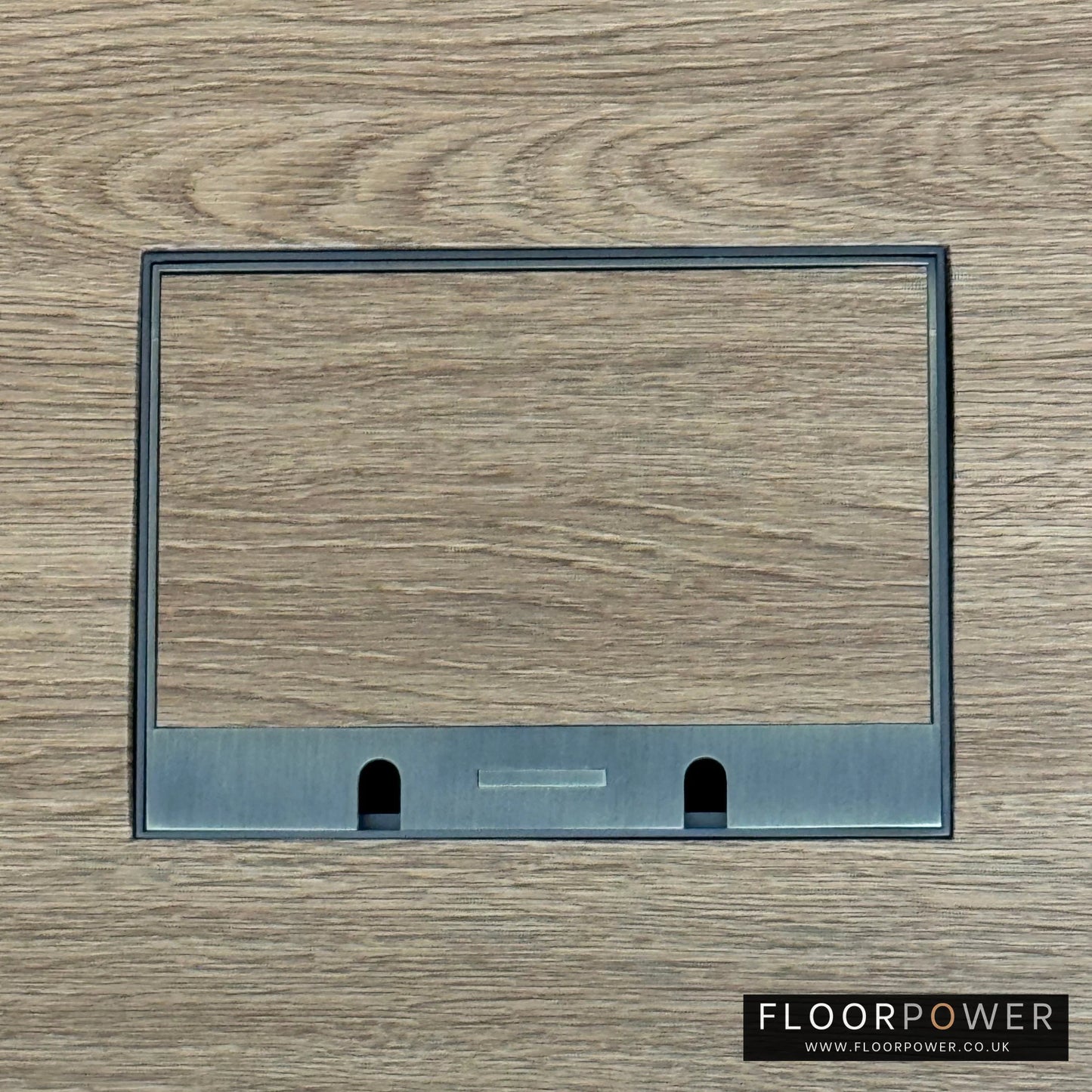 Satin Brass Double Recessed Flush Floor Sockets in an Oak Floor with oak flooring also inset into the lid.