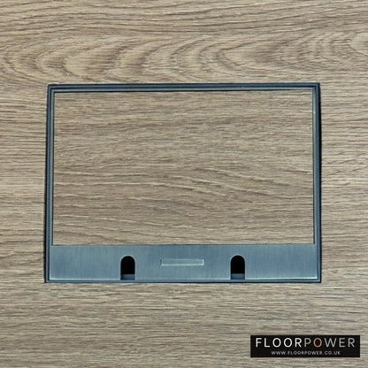 Satin Brass Double Recessed Flush Floor Sockets in an Oak Floor with oak flooring also inset into the lid.