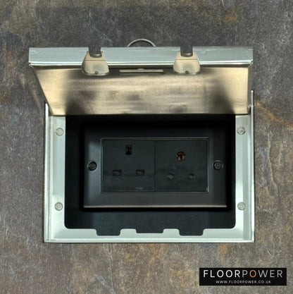 Satin Stainless Double Recessed Flush Floor Lighting Combination Socket (13A & 5A Round Pin Plug Sockets) in a stone floor.