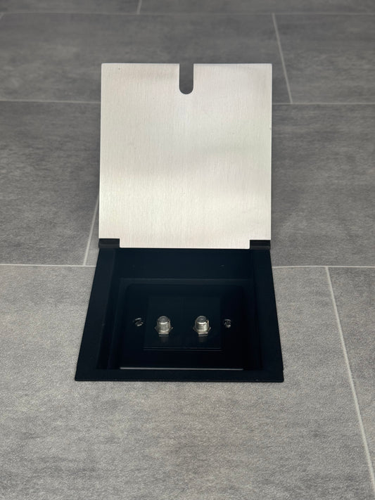 A satin stainless recessed floor socket with 2 satellite connectors.