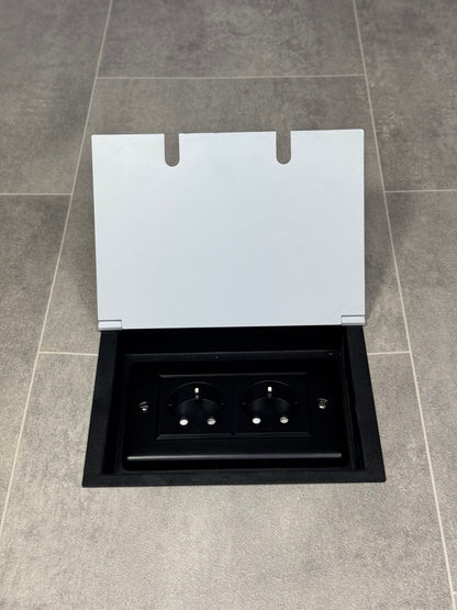 White recessed floor socket with a double (2 Gang) Schuko (European) plug socket.