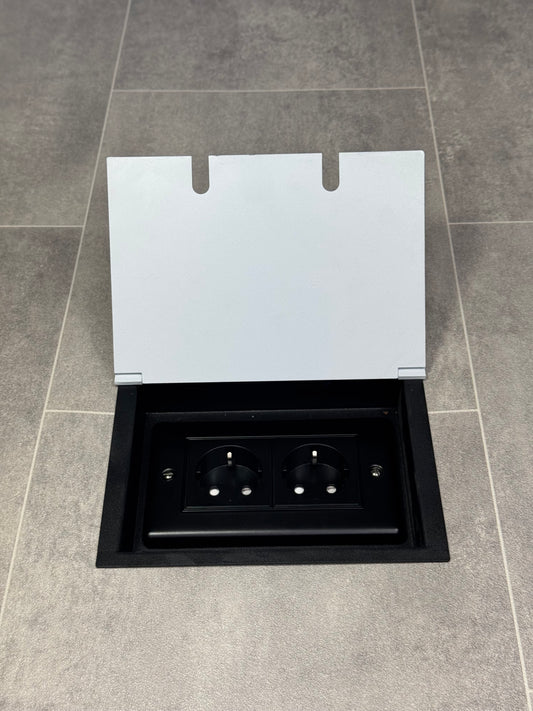 White recessed floor socket with a double (2 Gang) Schuko (European) plug socket.