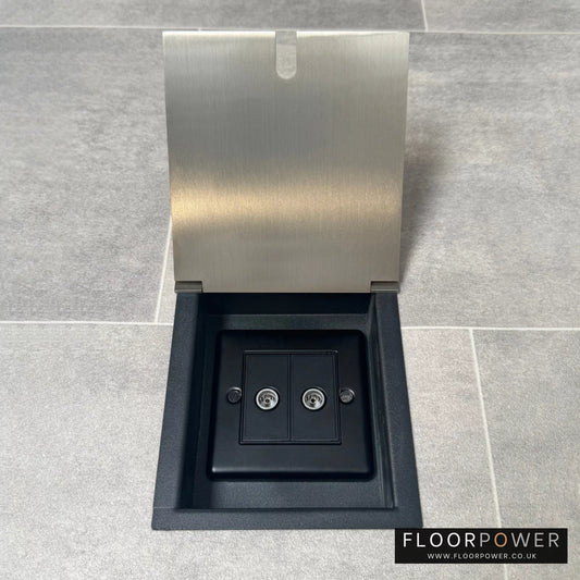 Satin nickel recessed floor socket with an open cover revealing the 2 gang TV socket.
