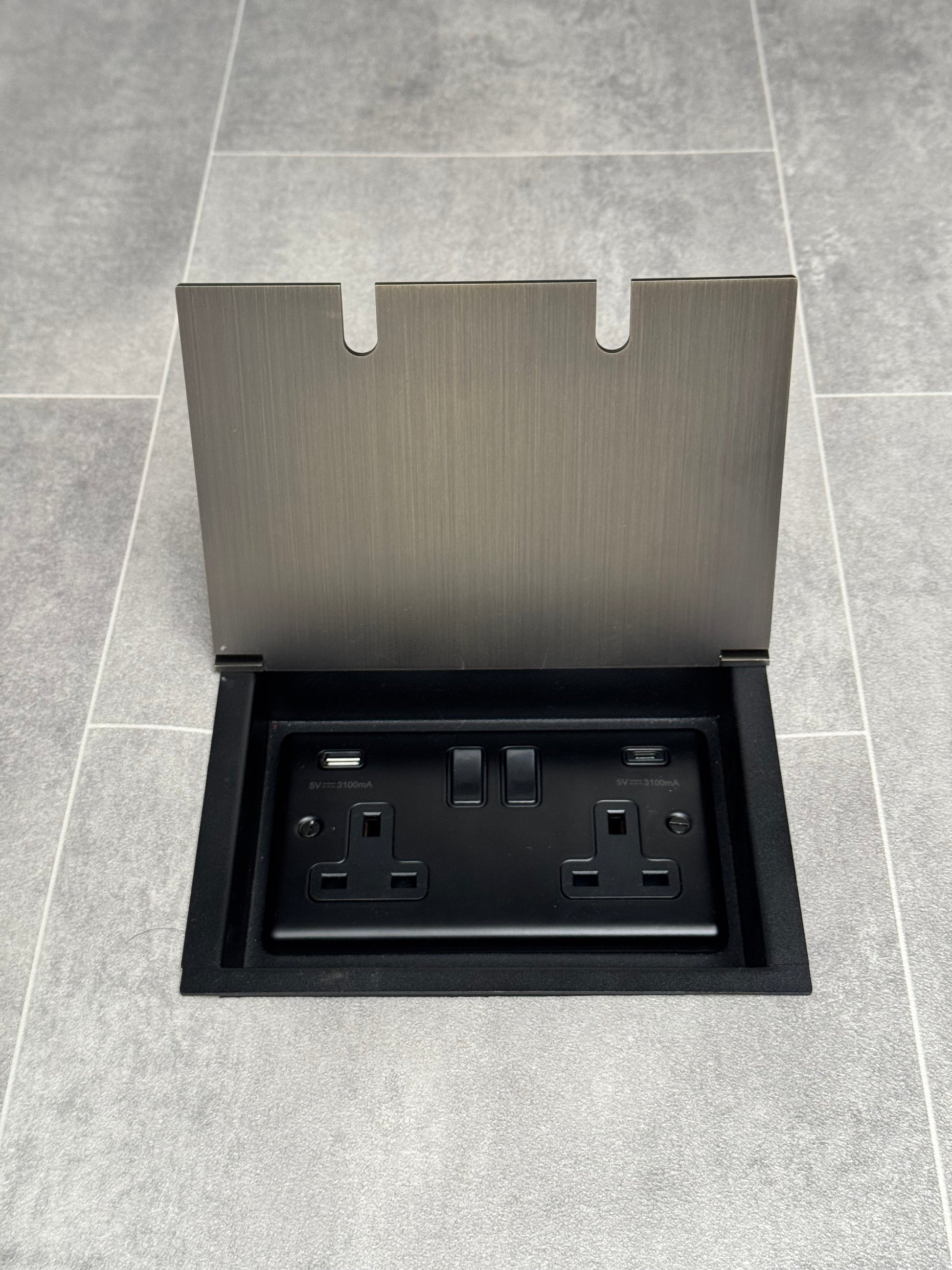 Recessed floor socket in antique brass with a double gang design, featuring a double 13 Amp switched socket with USB C+A.