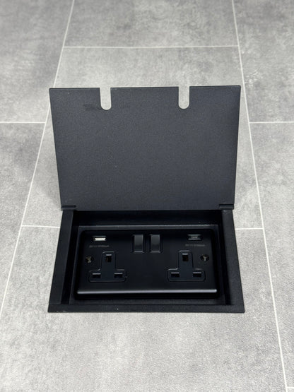 Double recessed floor socket in matt black, featuring a double 13 Amp switched socket with USB C+A charging ports.