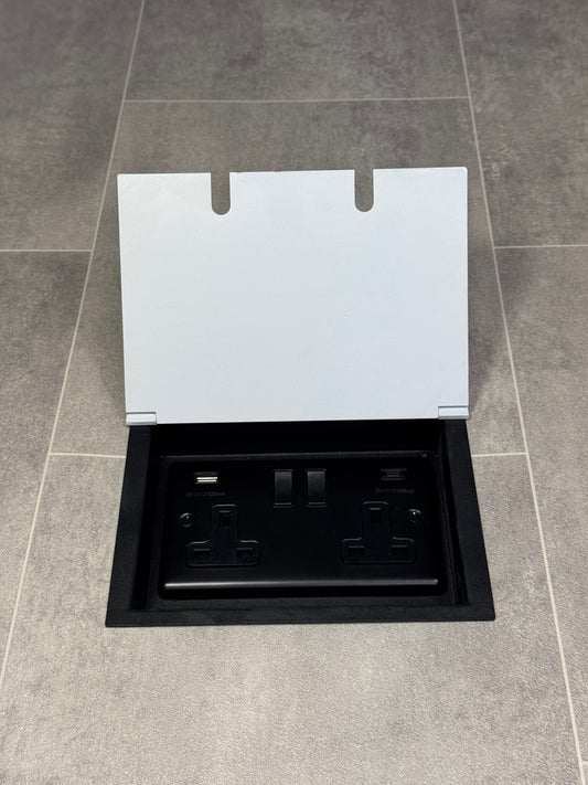 A white double recessed floor socket featuring a double 13 Amp switched socket with USB C+A charging ports.