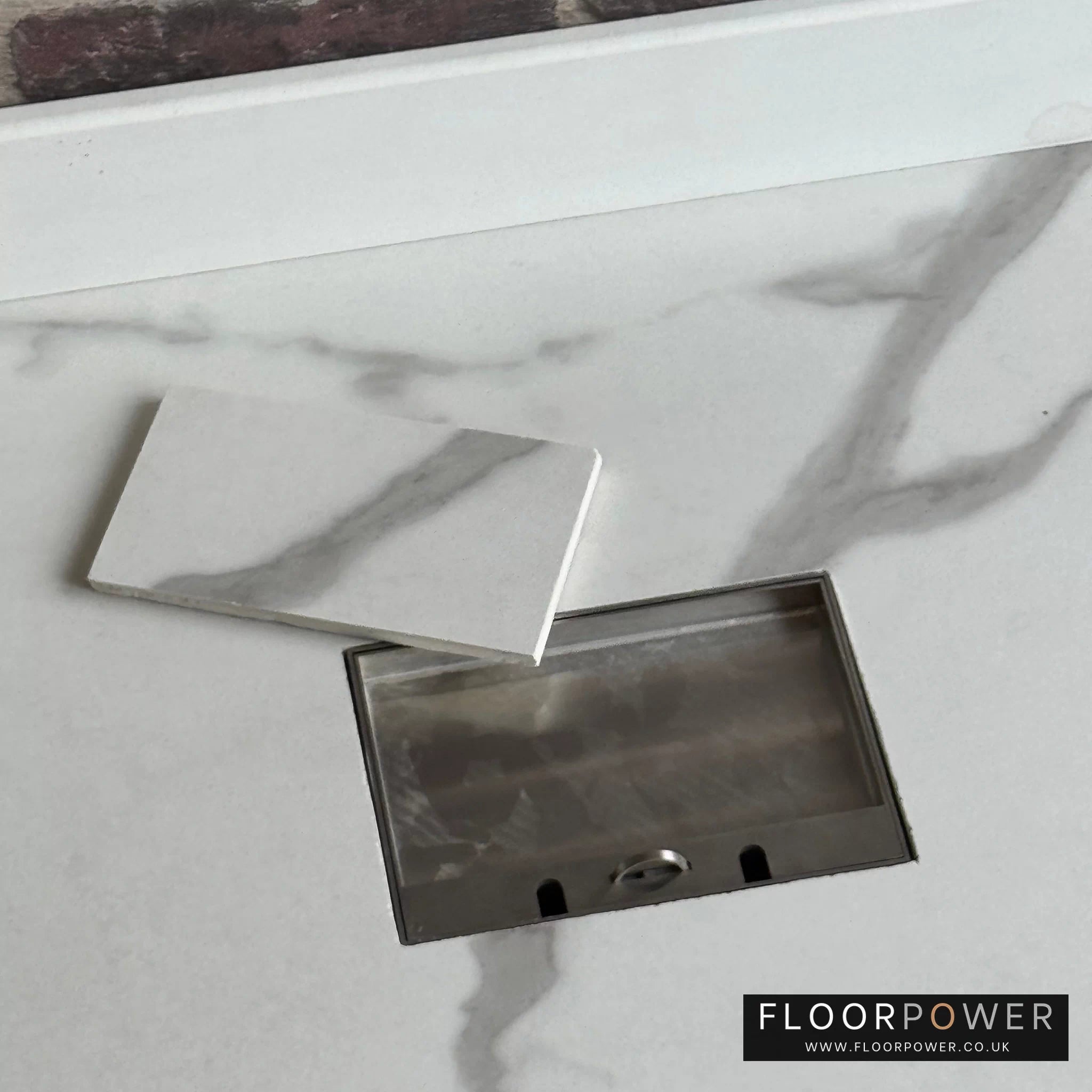 Insert the flooring material into the inlay lid of the concealed flush recessed floor socket