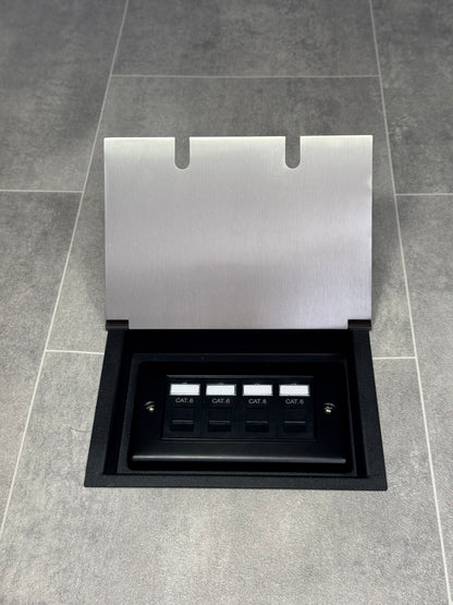 A satin stainless steel double recessed floor socket with a 4 gang RJ45 Cat6 socket, set against a grey tiled floor.