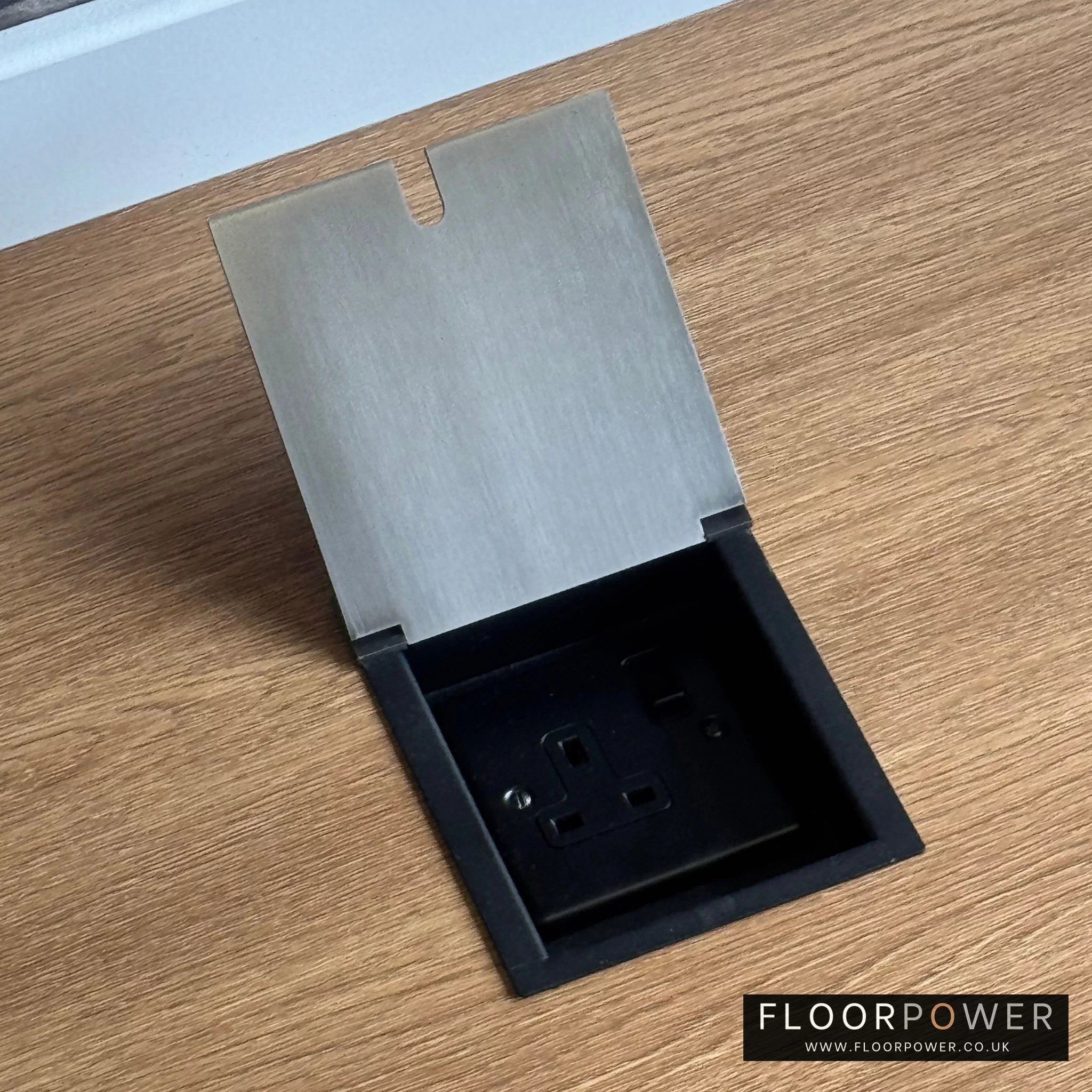 Completed recessed floor socket ready to use.
