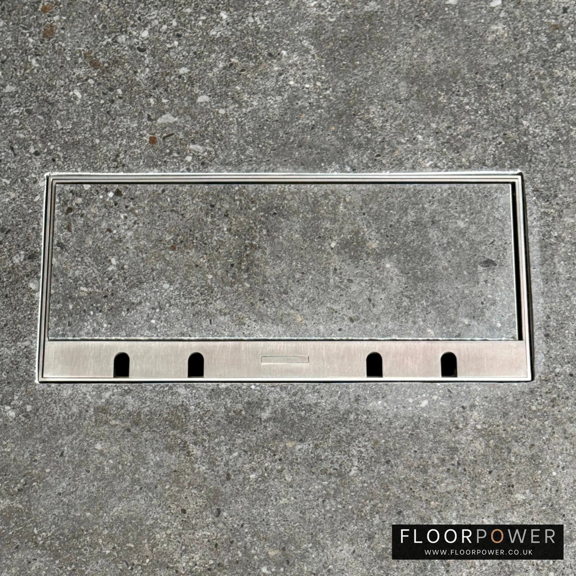 Flush Recessed Floor Socket with Satin Stainless Surround in grey stone floor