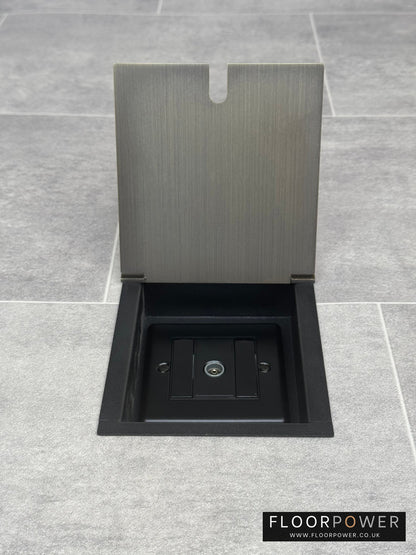 Recessed floor socket in antique brass with a single TV aerial socket.