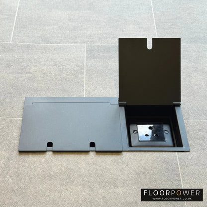Lighting combination triple floor socket in Matt Black with 5A round pin socket lid open.
