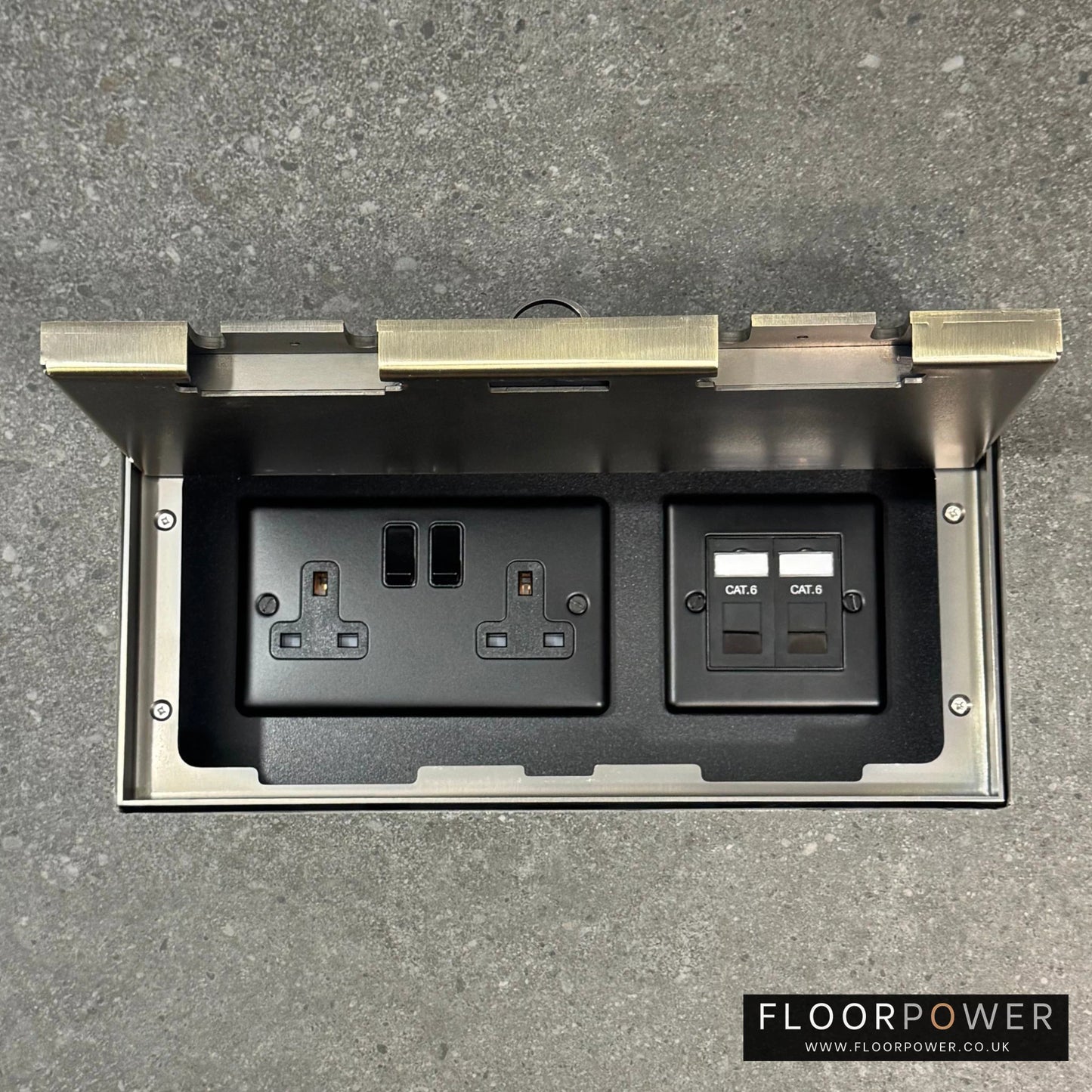 Triple Network Combination Flush Recessed Floor Socket with Antique Brass Surround in grey stone floor