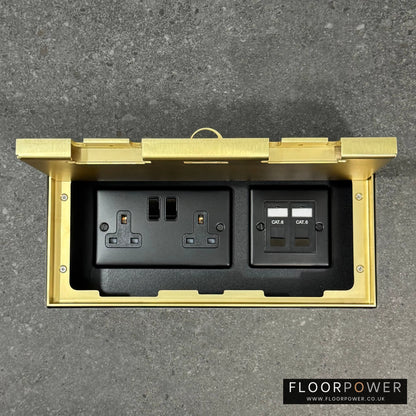 Triple Network Combination Flush Recessed Floor Socket with Satin Brass Surround in grey stone floor