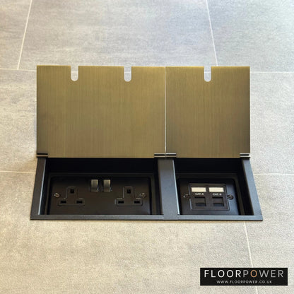 Antique Brass network combination triple floor socket with double 13A switched plug socket and two RJ45 Cat6 network socket, both lids open.