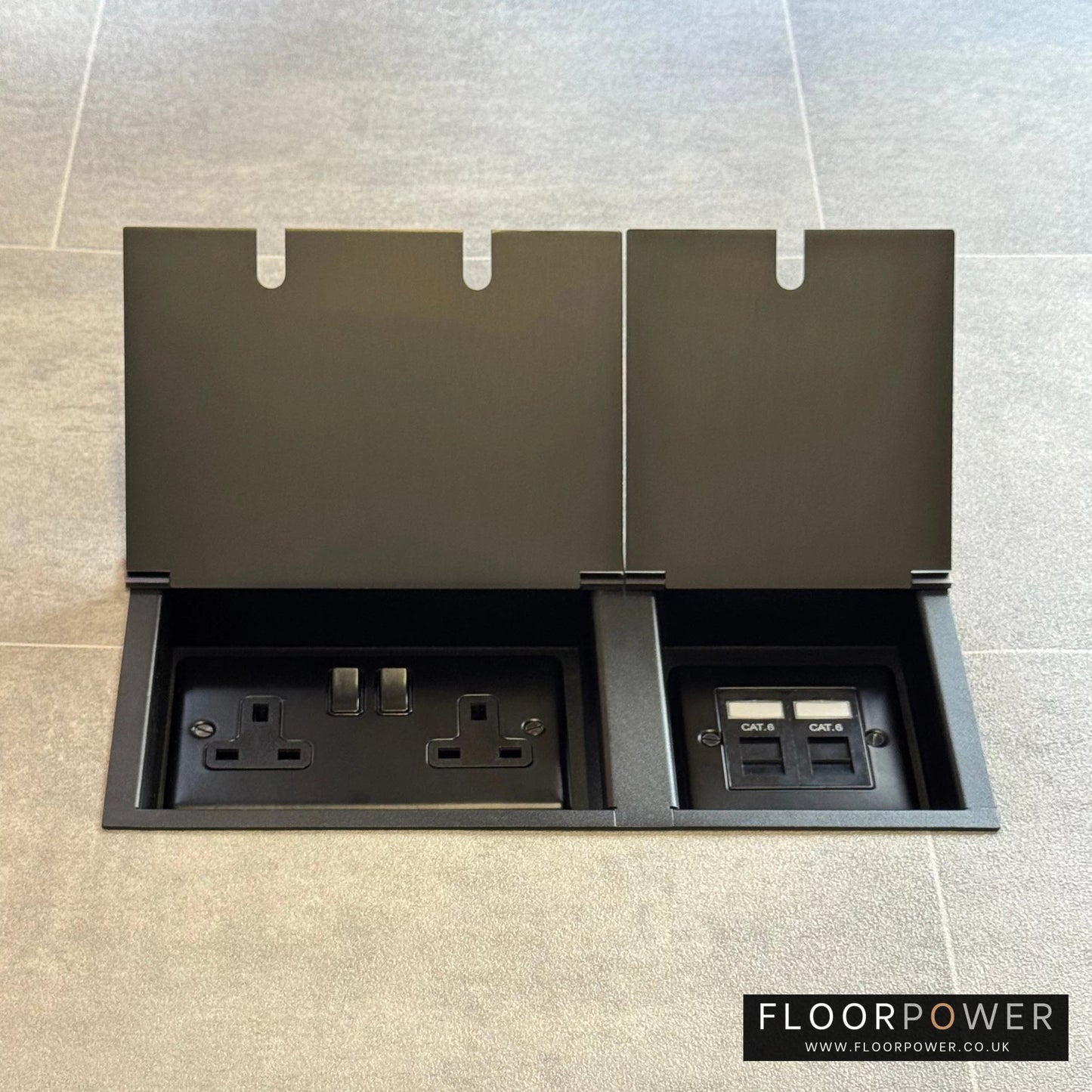 Old Bronze network combination triple floor socket with double 13A switched plug socket and two RJ45 Cat6 network socket, both lids open.