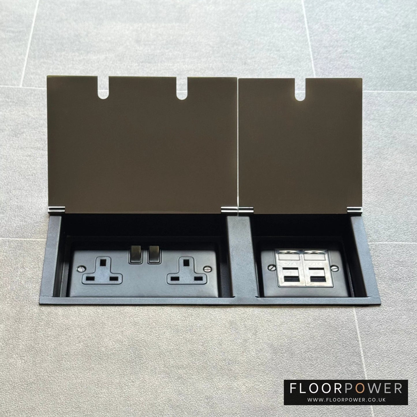 Satin Stainless network combination triple floor socket with double 13A switched plug socket and two RJ45 Cat6 network socket, both lids open.