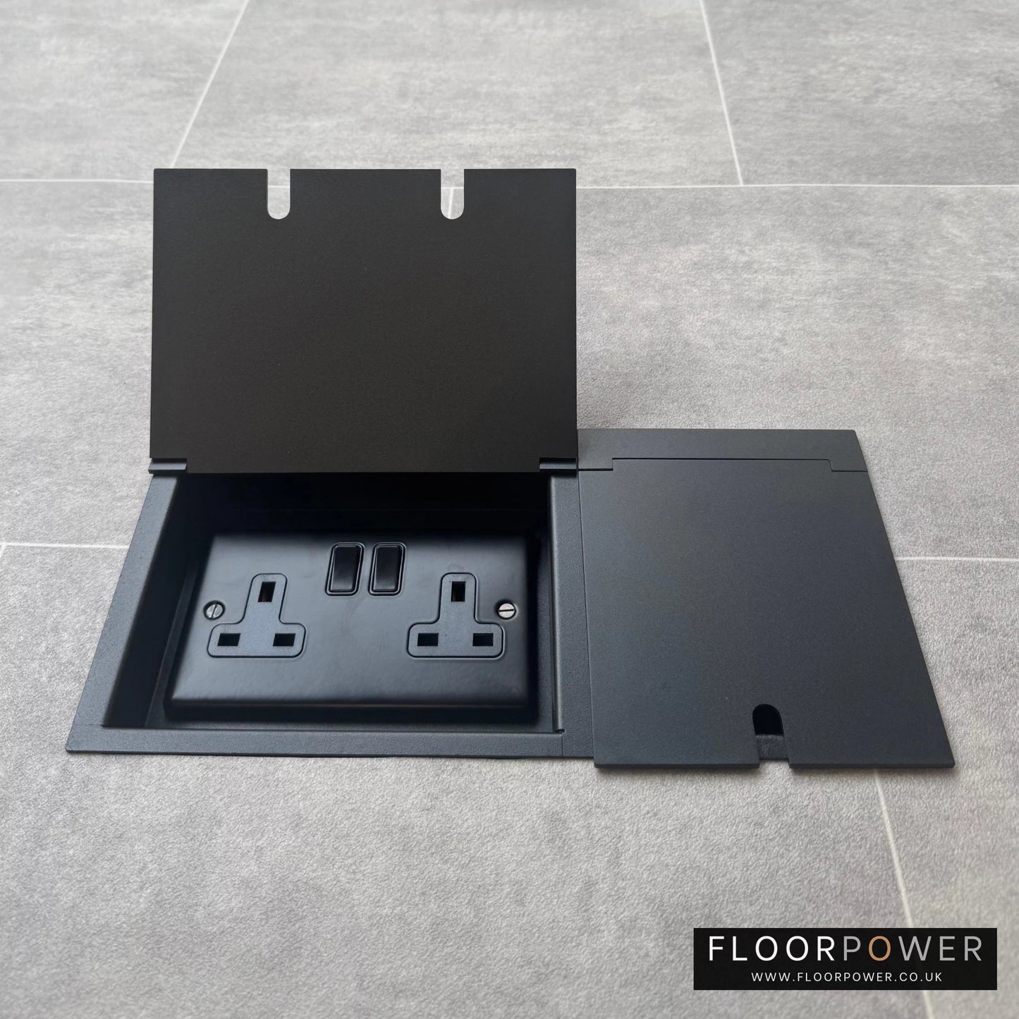 Triple Recessed Floor Socket in Matt Black with double side lid open showing plug socket.