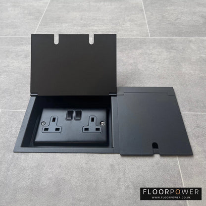 Triple Recessed Floor Socket in Matt Black with double side lid open showing plug socket.