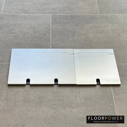 Closed Triple Recessed Floor Socket in Satin Stainless on tiled floor.