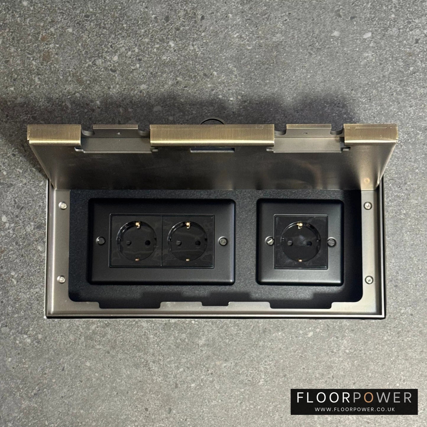 Triple Schuko (European) Plug Socket Flush Recessed Floor Socket with Antique Brass surround in grey stone floor