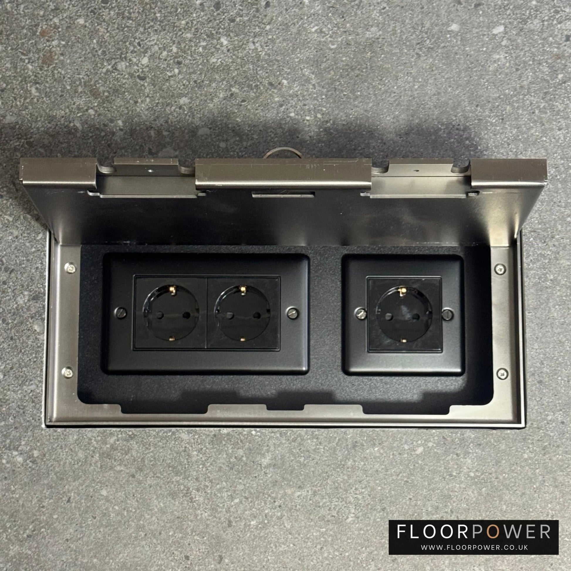 Triple Schuko (European) Plug Socket Flush Recessed Floor Socket with Old Bronze surround in grey stone floor