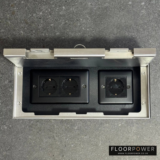 Triple Schuko (European) Plug Socket Flush Recessed Floor Socket with Satin Stainless surround in grey stone floor