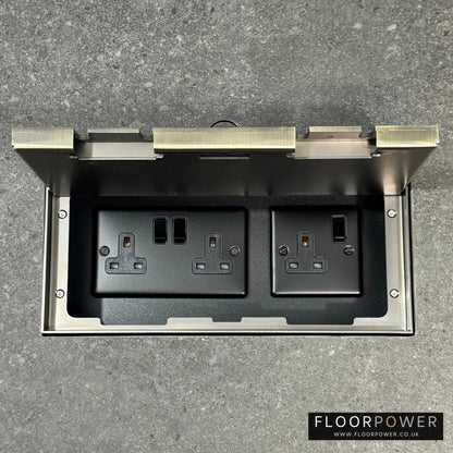 Triple Plug Socket Combination Flush Recessed Floor Socket with Antique Brass Surround in grey stone floor