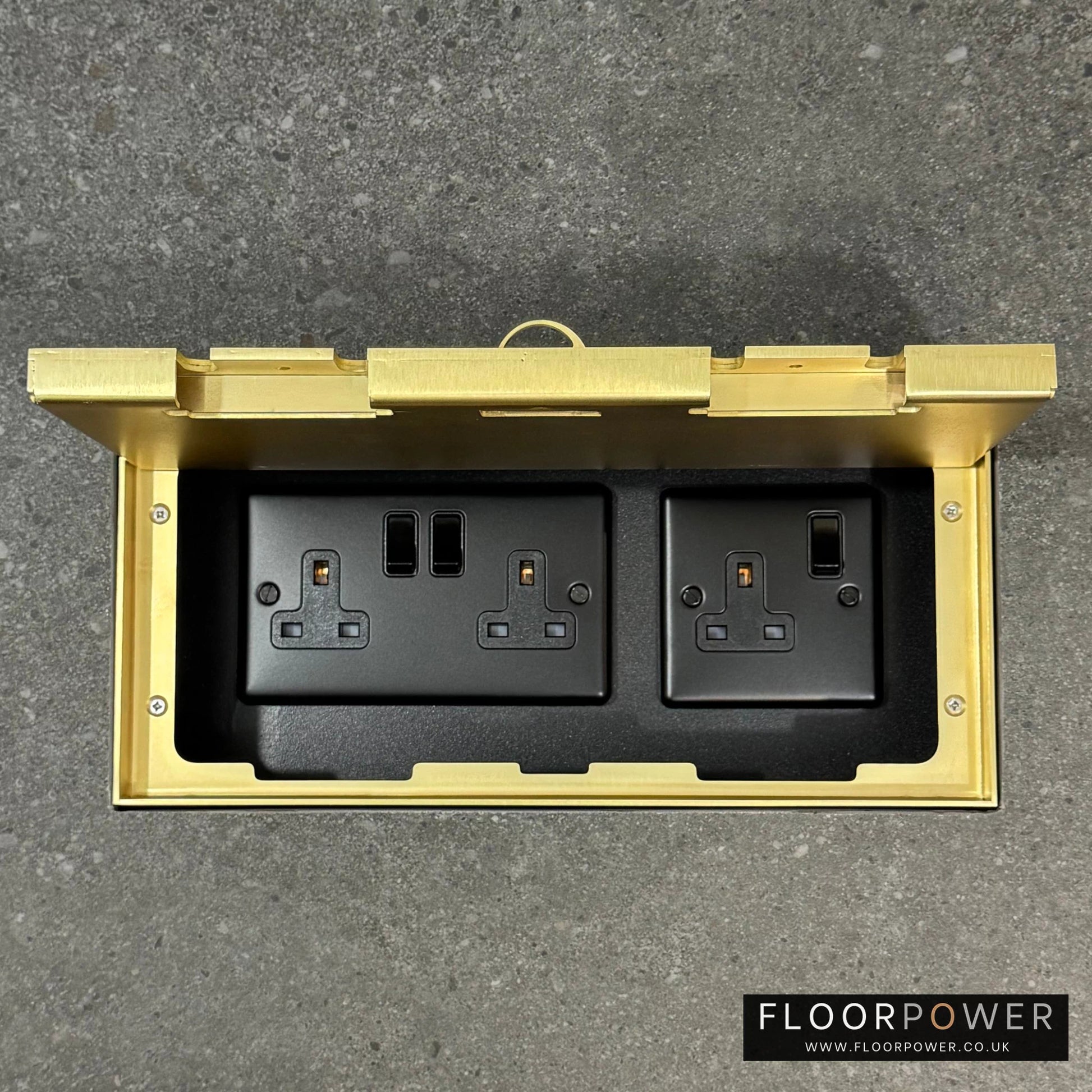 Triple Plug Socket Flush Recessed Floor Socket with Satin Brass Surround in grey stone floor